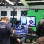 Neurodivergent creators working on digital media projects, collaborating, and learning skills at JDS Creative Academy in an inclusive, supportive environment.