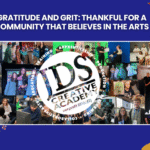 Students and instructors at JDS Creative Academy smiling together during a fall arts class.