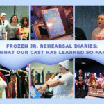 Frozen Jr cast rehearsing on stage, practicing dance and singing together